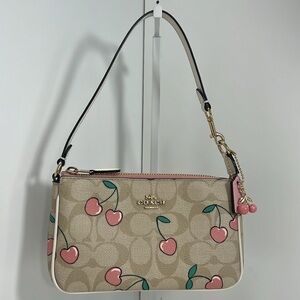 Coach Cherry Nolita in Sugnature Canvas